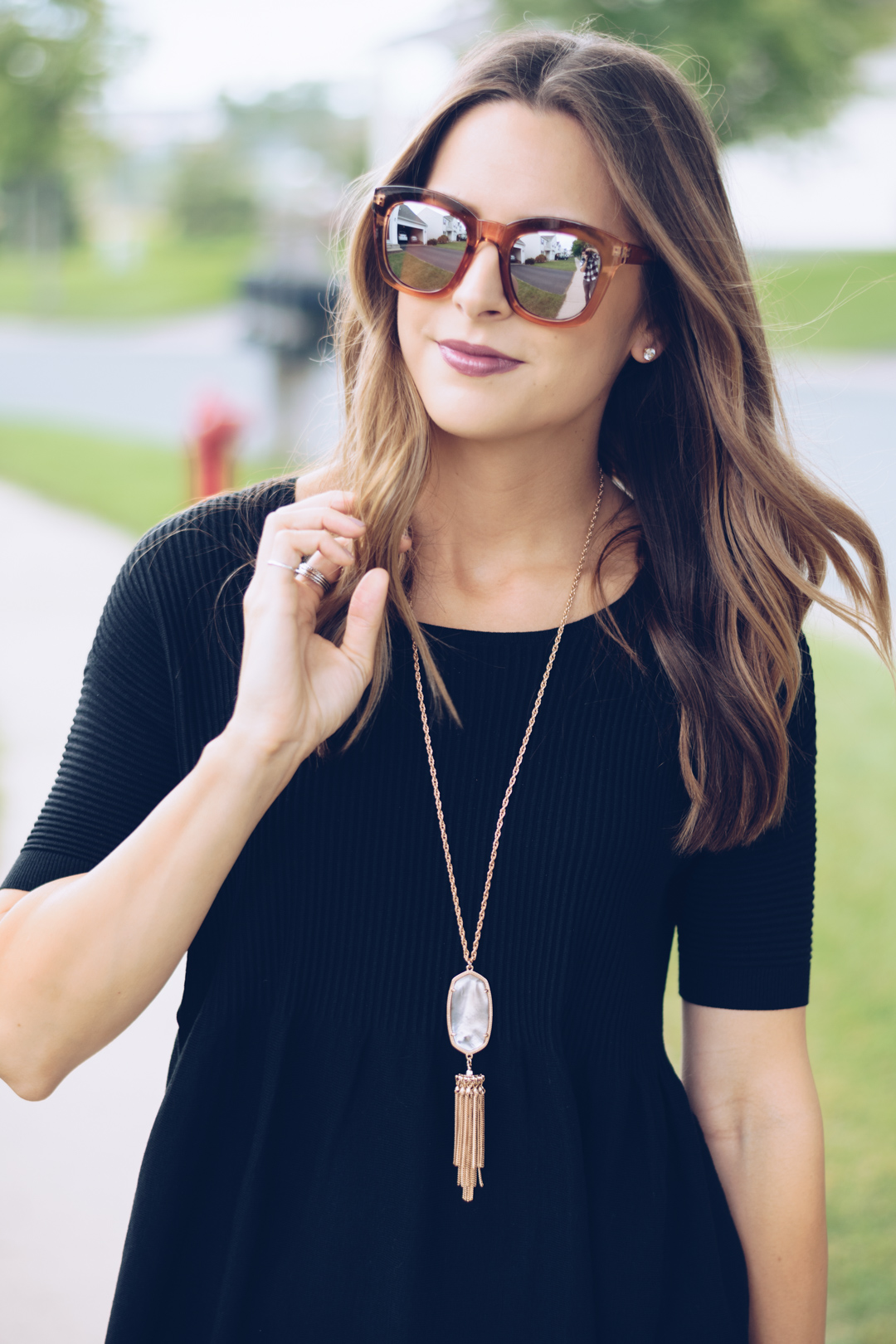 bp rose gold mirrored sunglasses, loft black peplum top, rocksbox kendra scott rayne necklace, rebecca minkoff medium mab tote