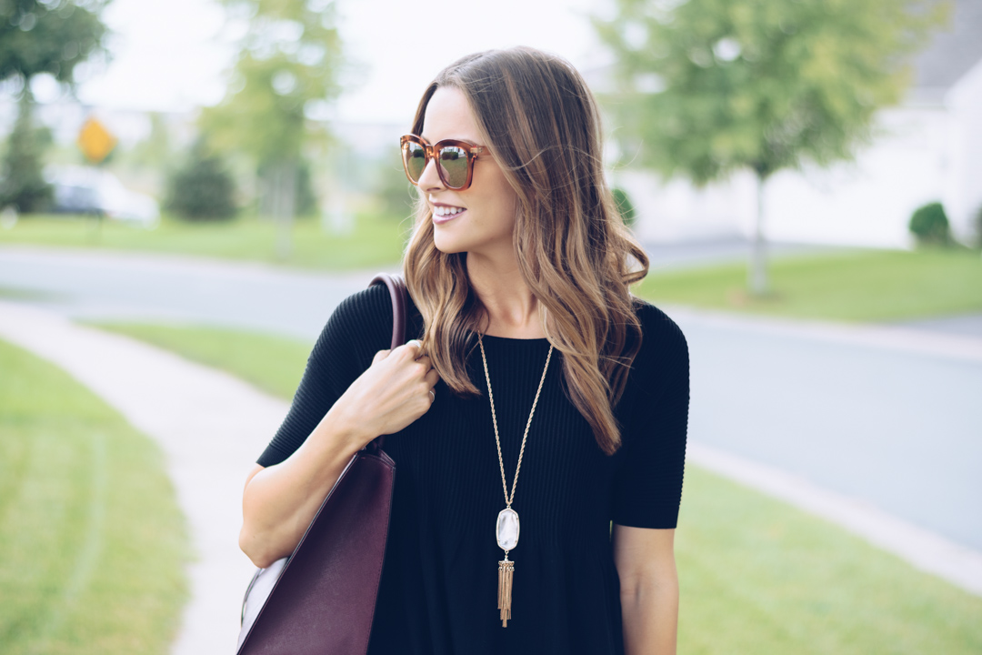 bp rose gold mirrored sunglasses, loft black peplum top, rocksbox kendra scott rayne necklace, rebecca minkoff medium mab tote