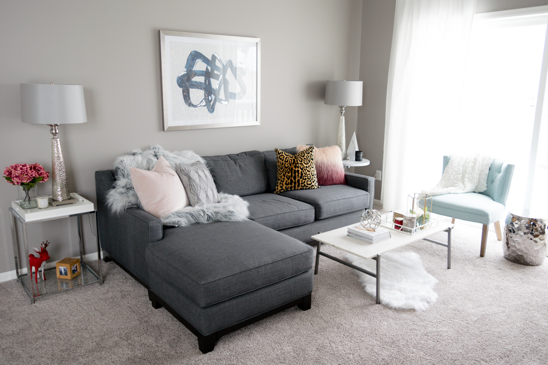 neutral throw pillows, faux fur throw, gray couch