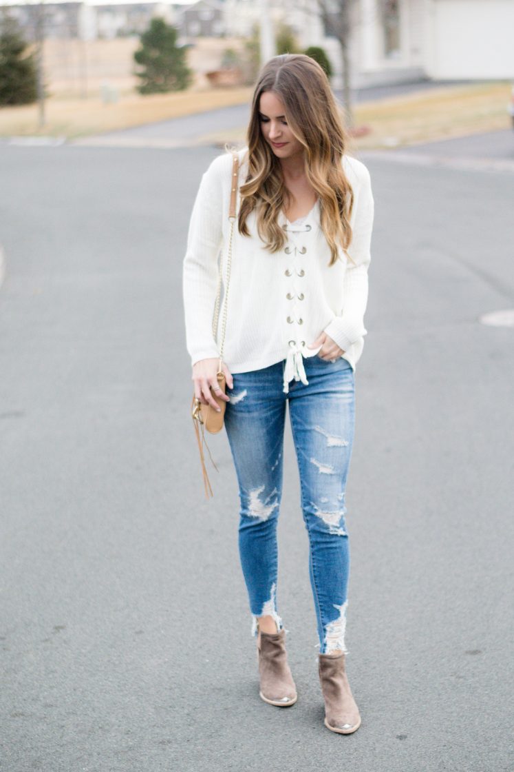 shop the mint love this lace up sweater, ivory laceup sweater, jeffrey campbell cromwell cut out booties outfit, american eagle shredded raw hem skinny jeans