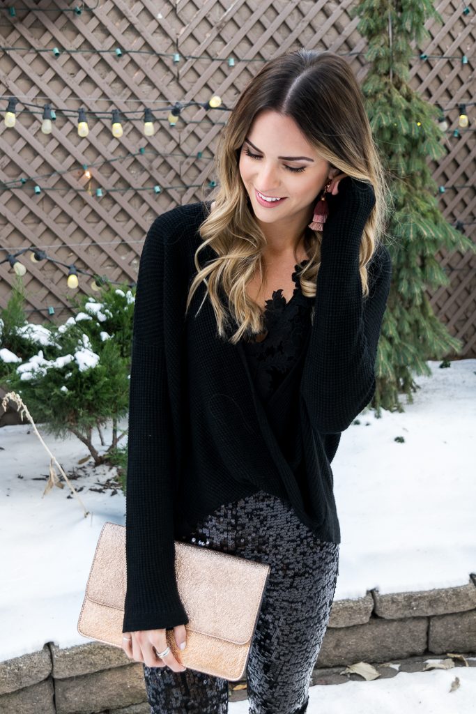 Express clutch, blush tassel earrings, all black holiday look, NYE outfit