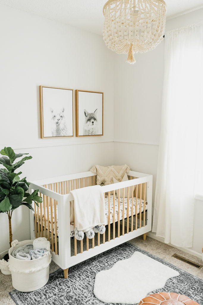 white crib boy nursery